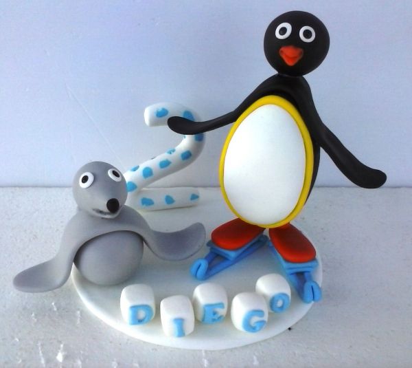 Topo de bolo Pingu com vela